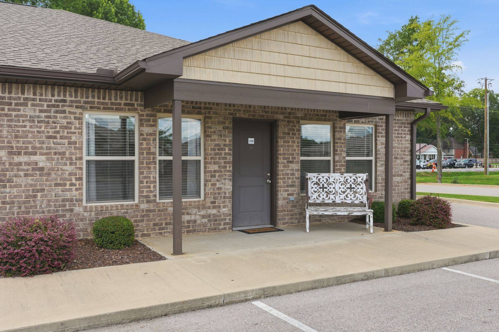Duplex at The Oaks on Chisholm with a covered front porch